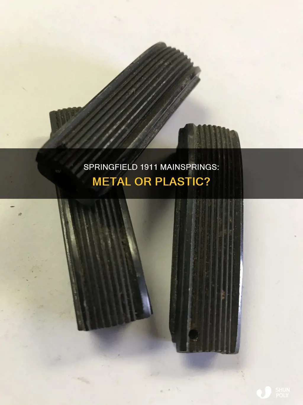 are springfields 1911 mainspring plastic or metal