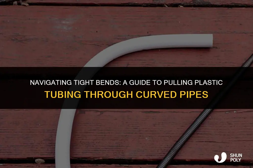 how do i pull plastic tubing through curved pipe