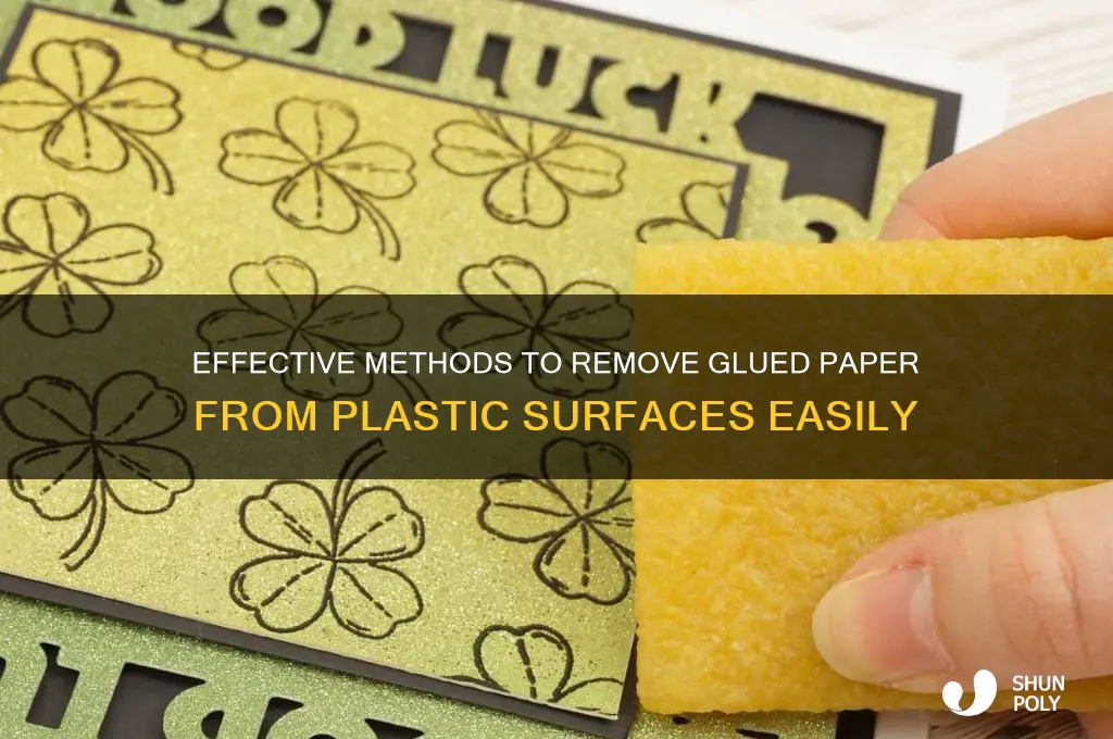 how do you remove glued paper from plastic