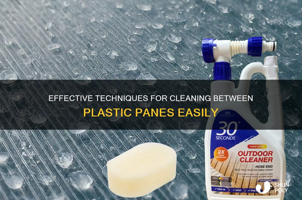how to clean between two panes of plastic