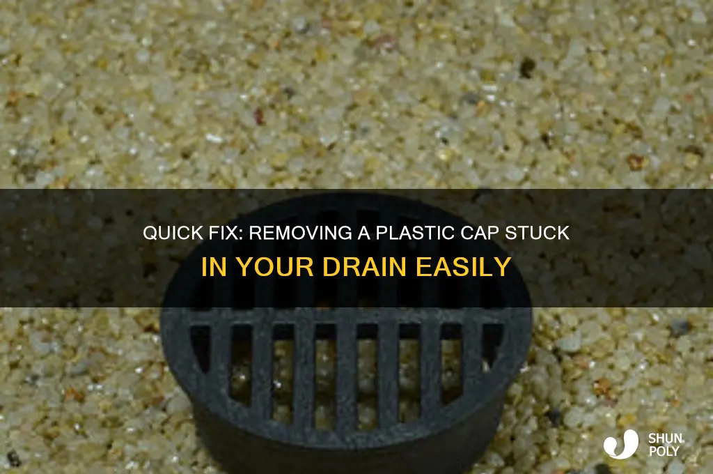 how to get a plastic cap out of a drain