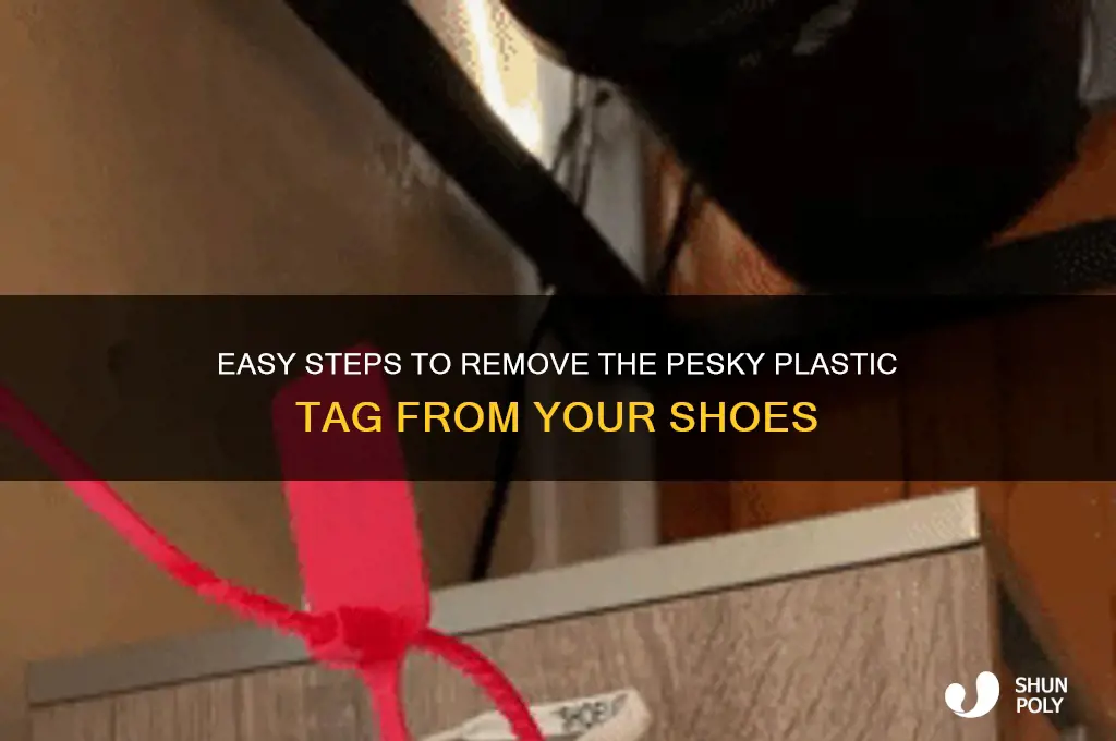 how to get eh plastic thing off shoes