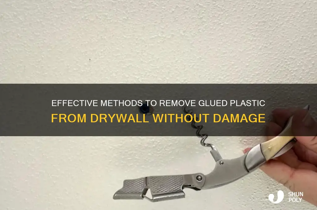 how to get glued on plastic off drywall