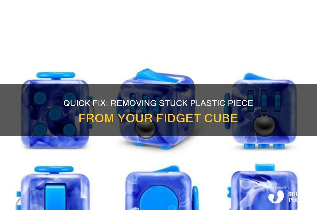 how to get plastic piece off fidget cube