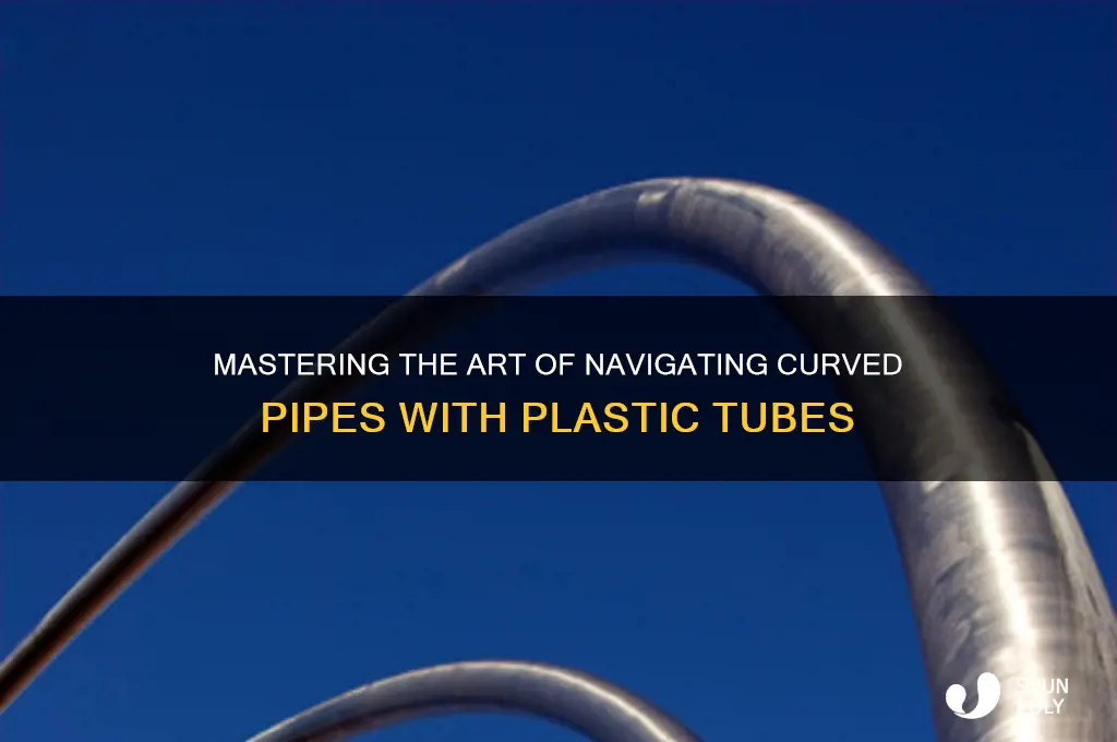 how to get plastic tube through curved pipe