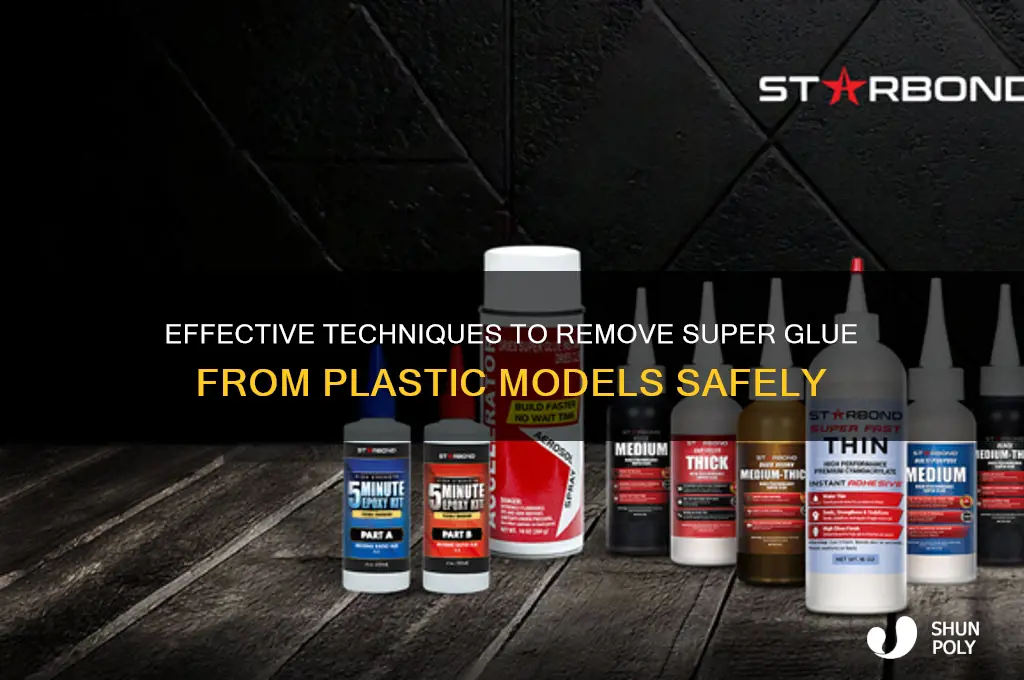 how to get super glue off plastic models