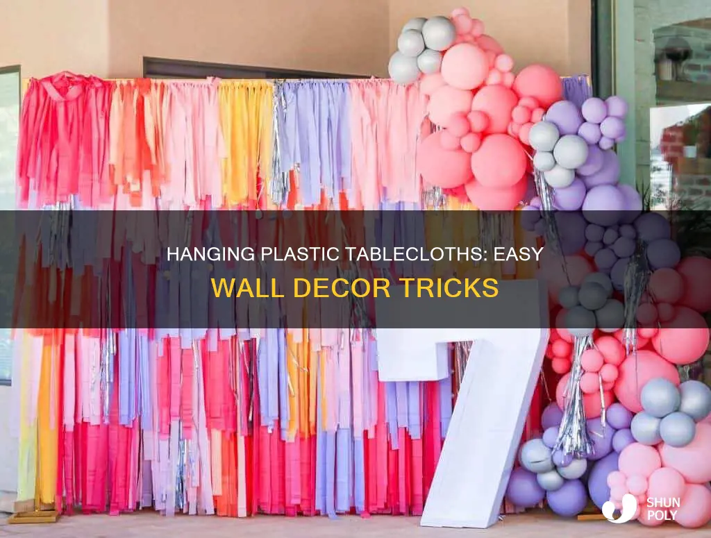 how to hang plastic tablecloths on wall
