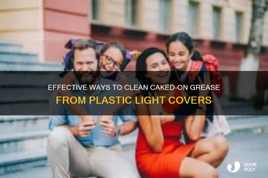 how to remove caked on grease from plastic light cover