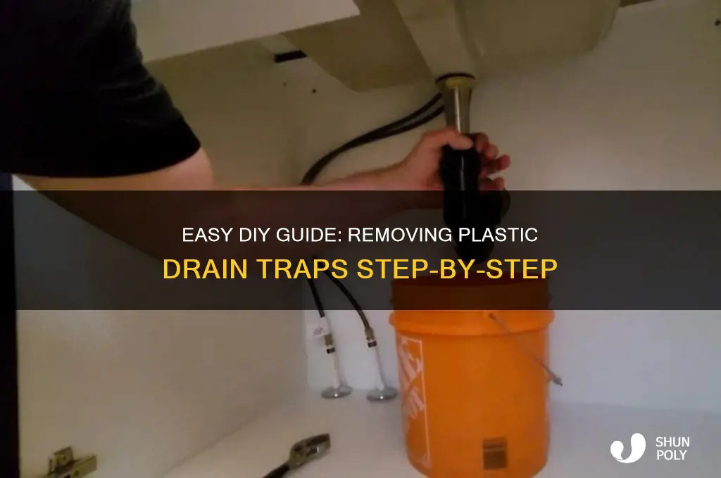 how to remove drain trap plastic