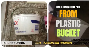 Scraping Off Dried Paint from a Plastic Bucket