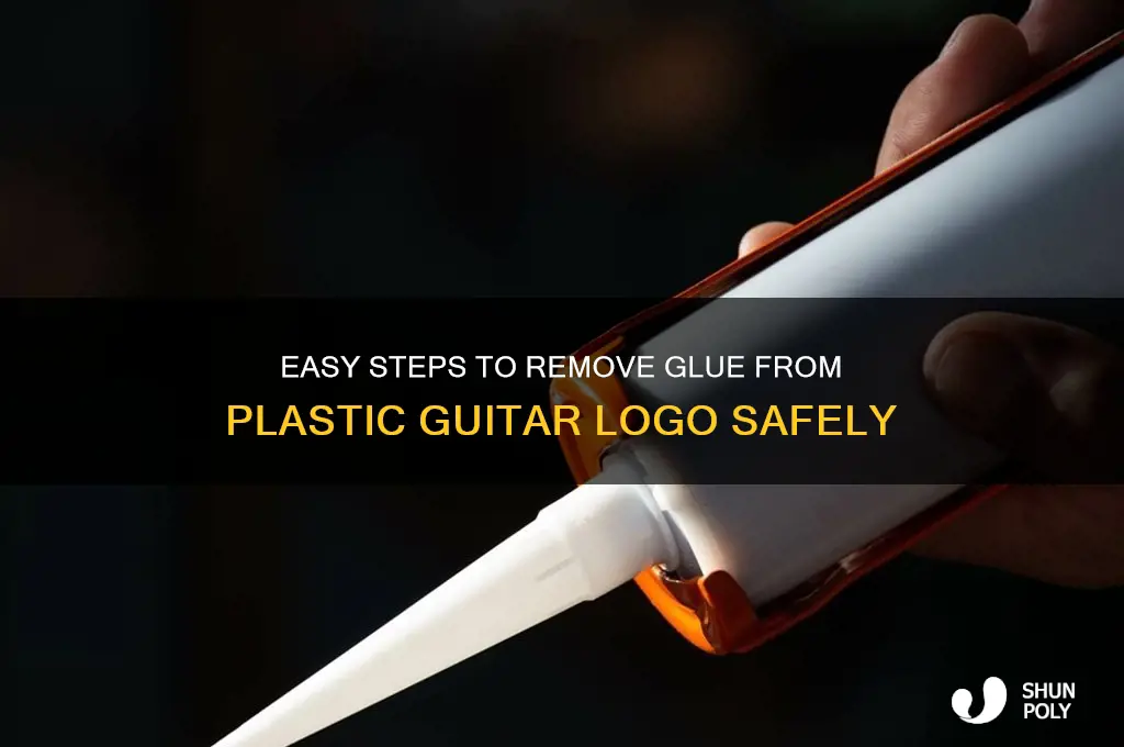 how to remove glue from back of plastic guitar logo