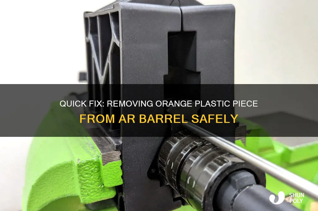 how to remove orange plastic piece from barrel of ar