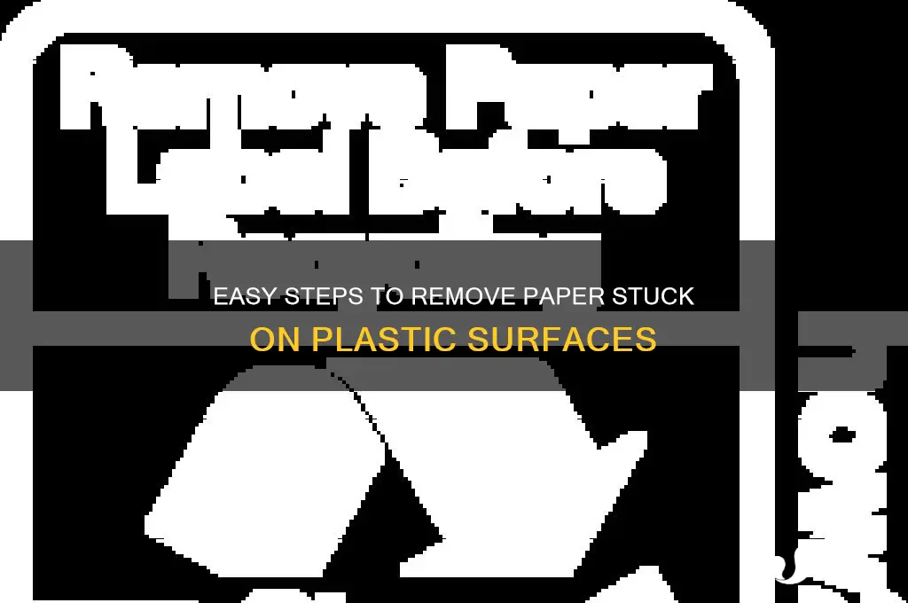 how to remove paper stuck on plastic