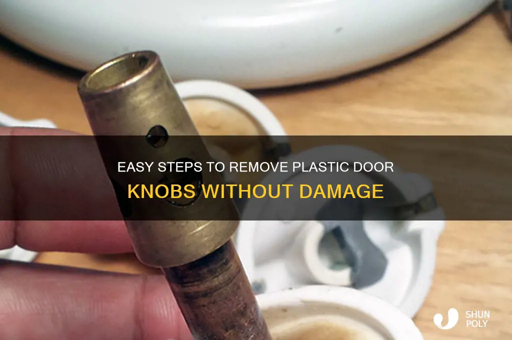 how to remove plastic door knobs