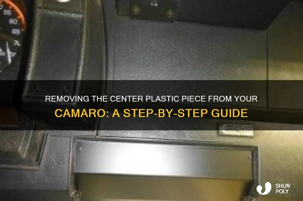 how to remove plastic piece from middle of camaro