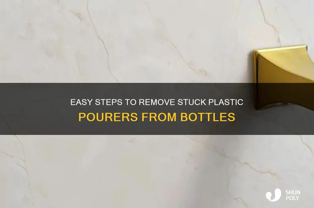how to remove plastic pourer from bottle