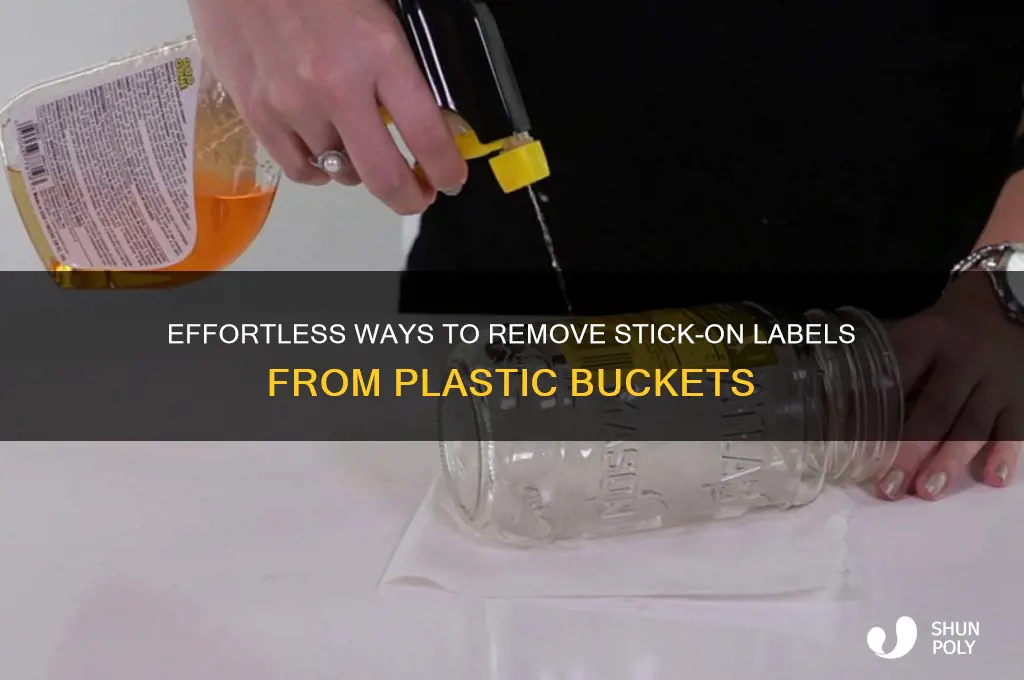how to remove stick on labels from plastic buckets