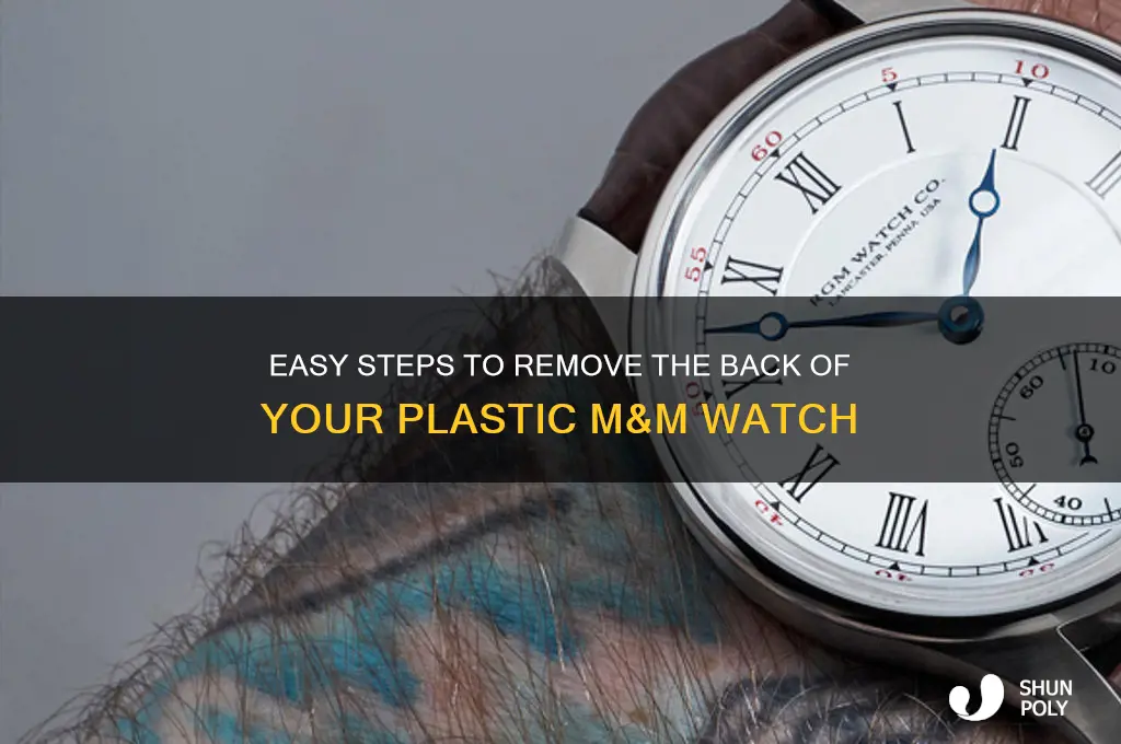how to remove the back of a plastic m&m watch