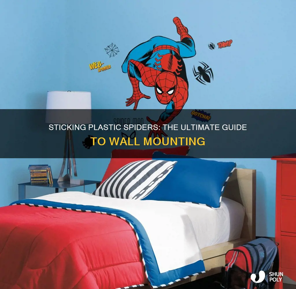 how to stick plastic spiders on walls
