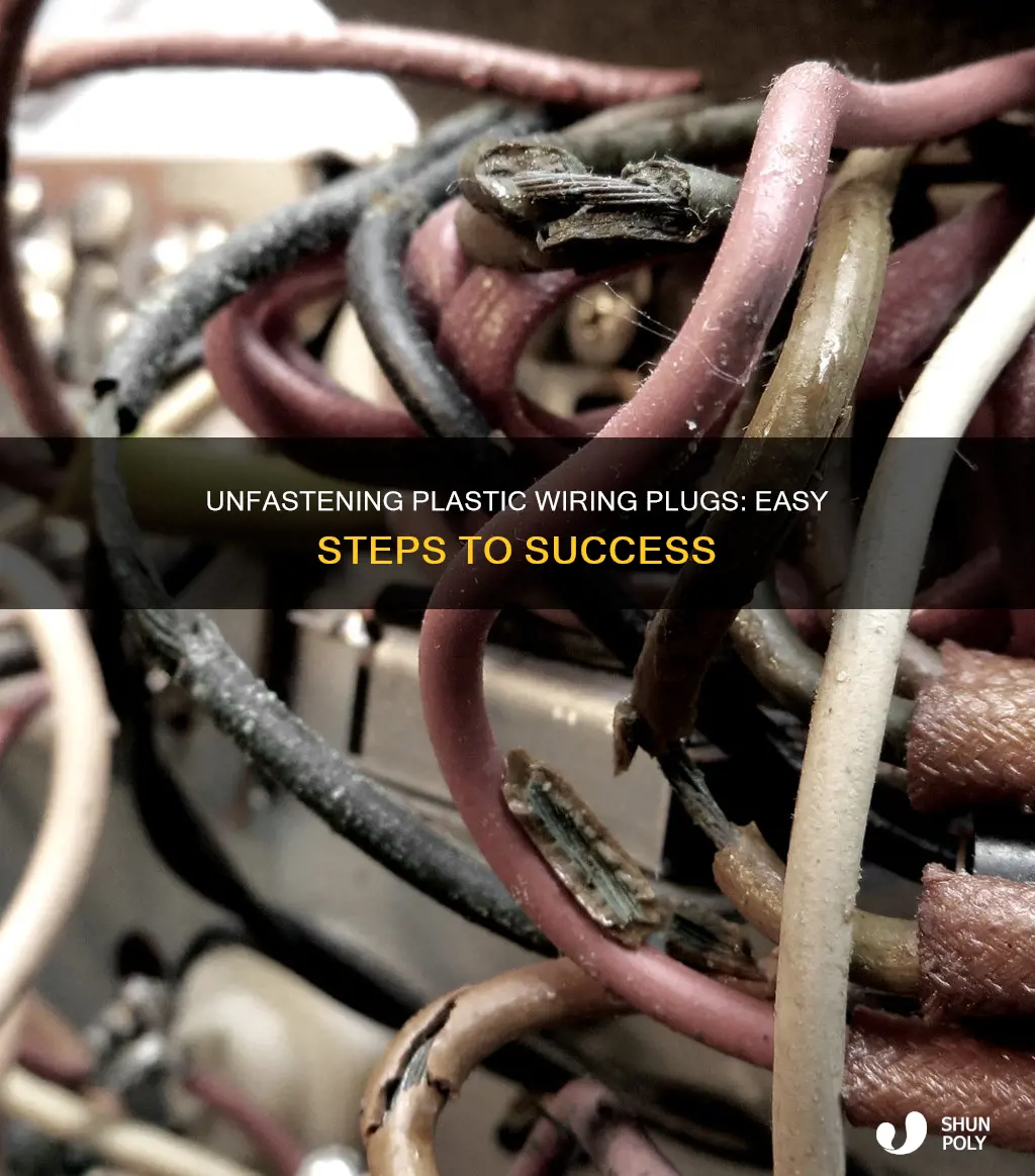 how to unhook plastic wiring plug ins