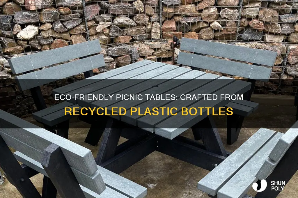 is a picnic table made from plastic bottles