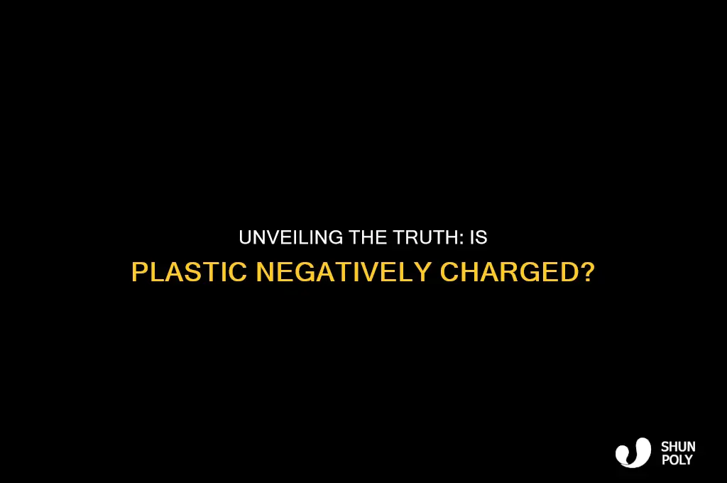 is plastic negatively charged