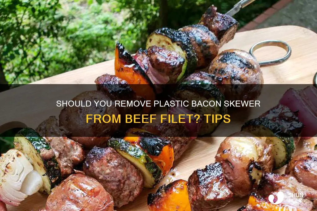 should i remove a plastic bacon skewer from beef filet