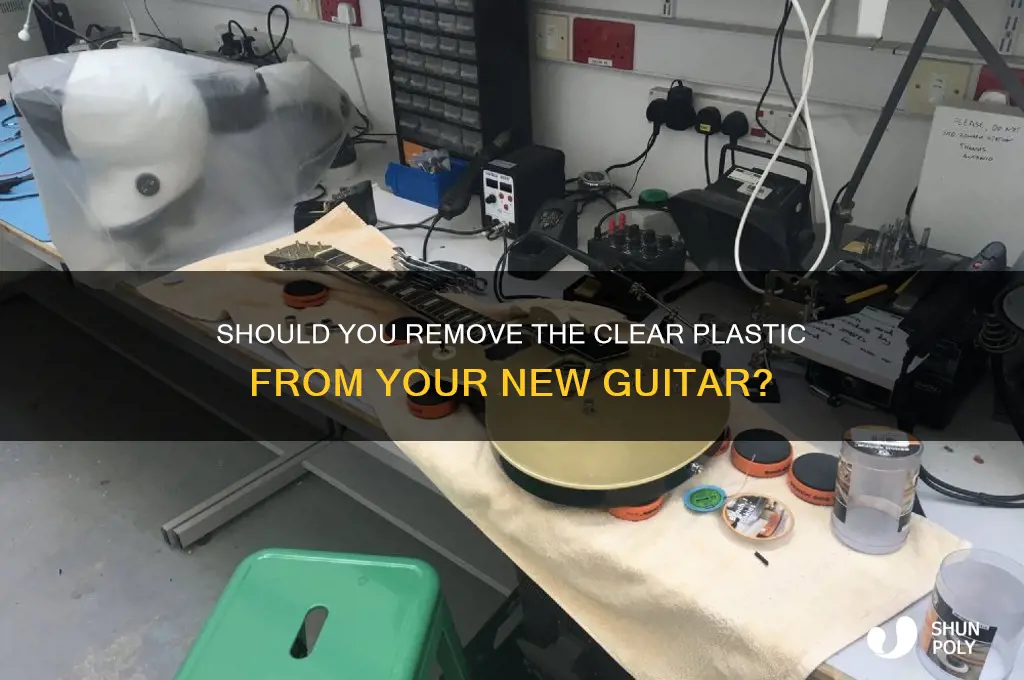 should i remove clear plastic from new guitar