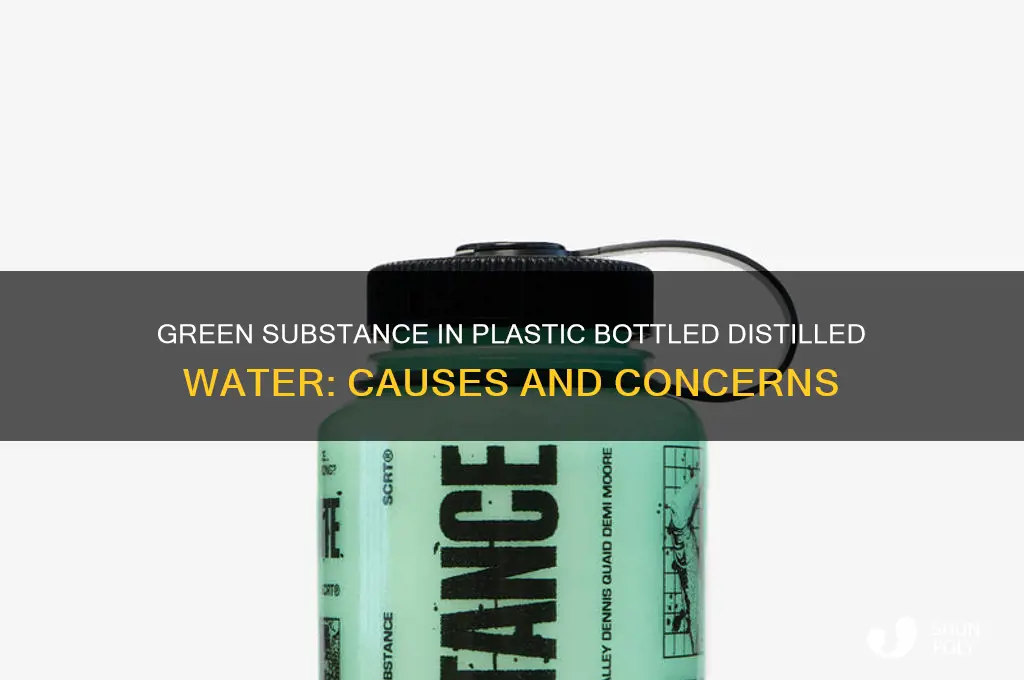 what is green stuff inside my plastic bottled distilled water