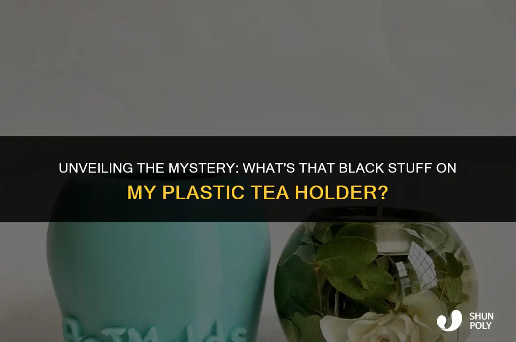 what is that black stuff on my plastic tea holder