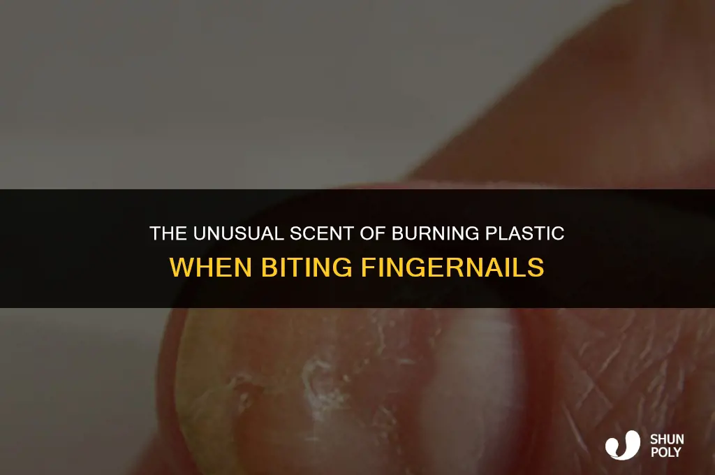when i bite my fingernails they smell like burning plastic