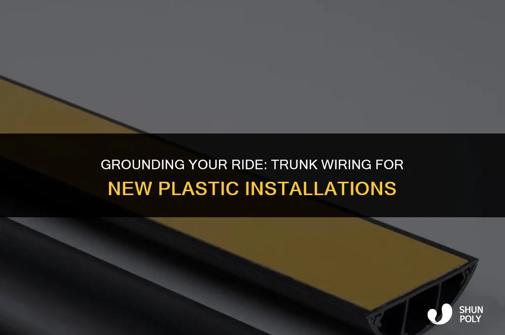 where does ground wire go in trunk after new plastic