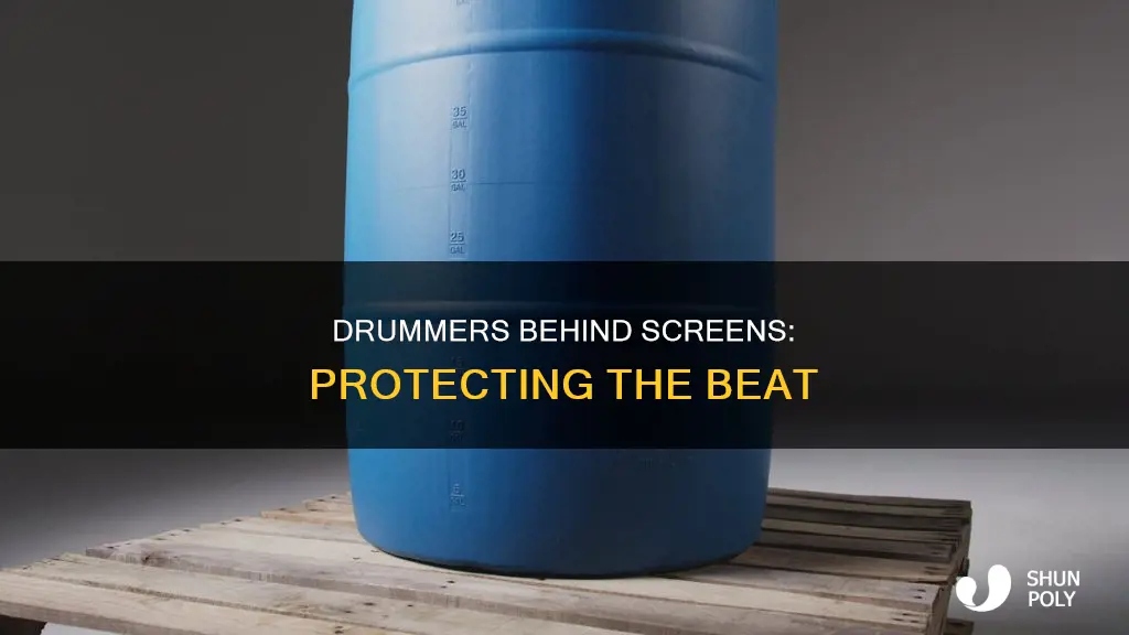why are drummers behind plastic screens