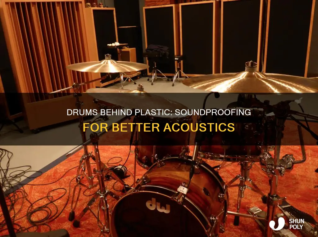 why do drums go behind plastic walls