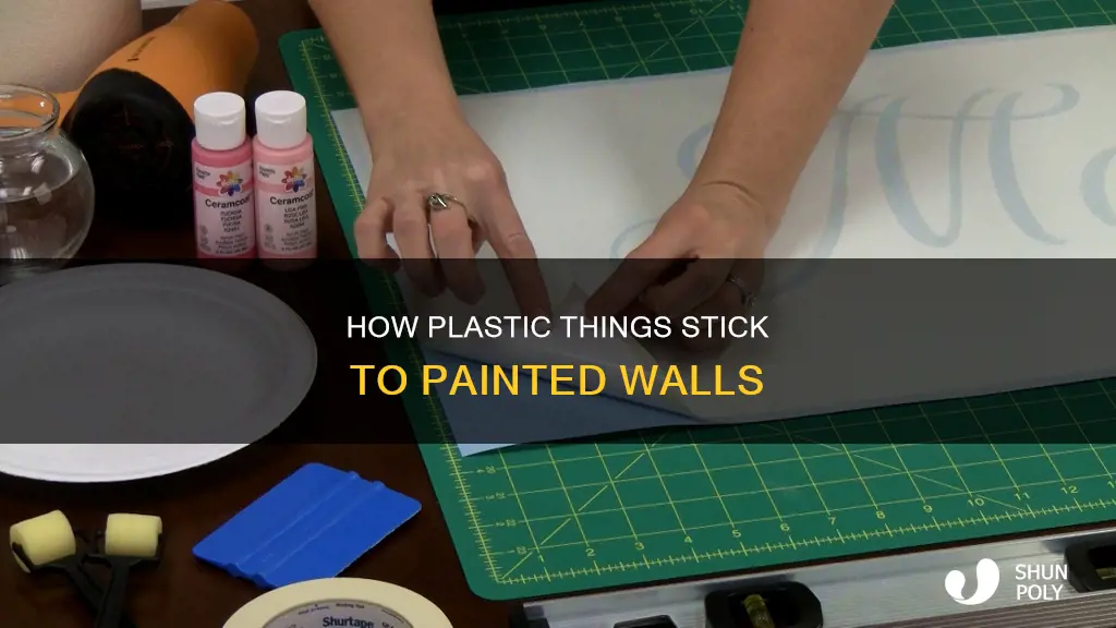 why do plastic things stick to painted walls