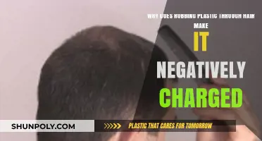 Why Plastic Rubbed Through Hair Gains Negative Charge: Explained
